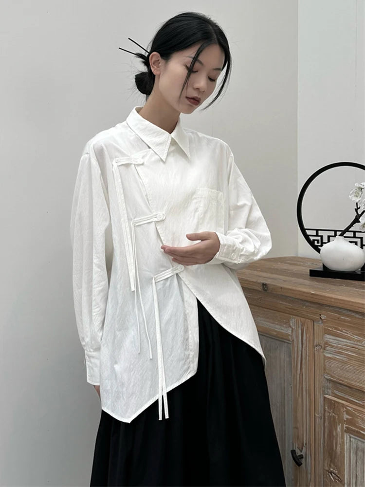 [EAM] Women White Buckle Irregular Big Size Blouse New Lapel Long Sleeve Loose Fit Shirt Fashion Tide Spring Autumn 2026 1DF7846