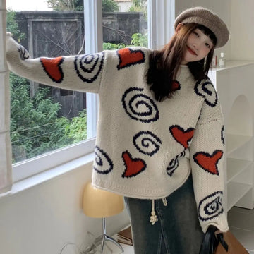 A soft and sweet Korean-style knitted sweater with a heart pattern loose versatile top women autumn and winter season